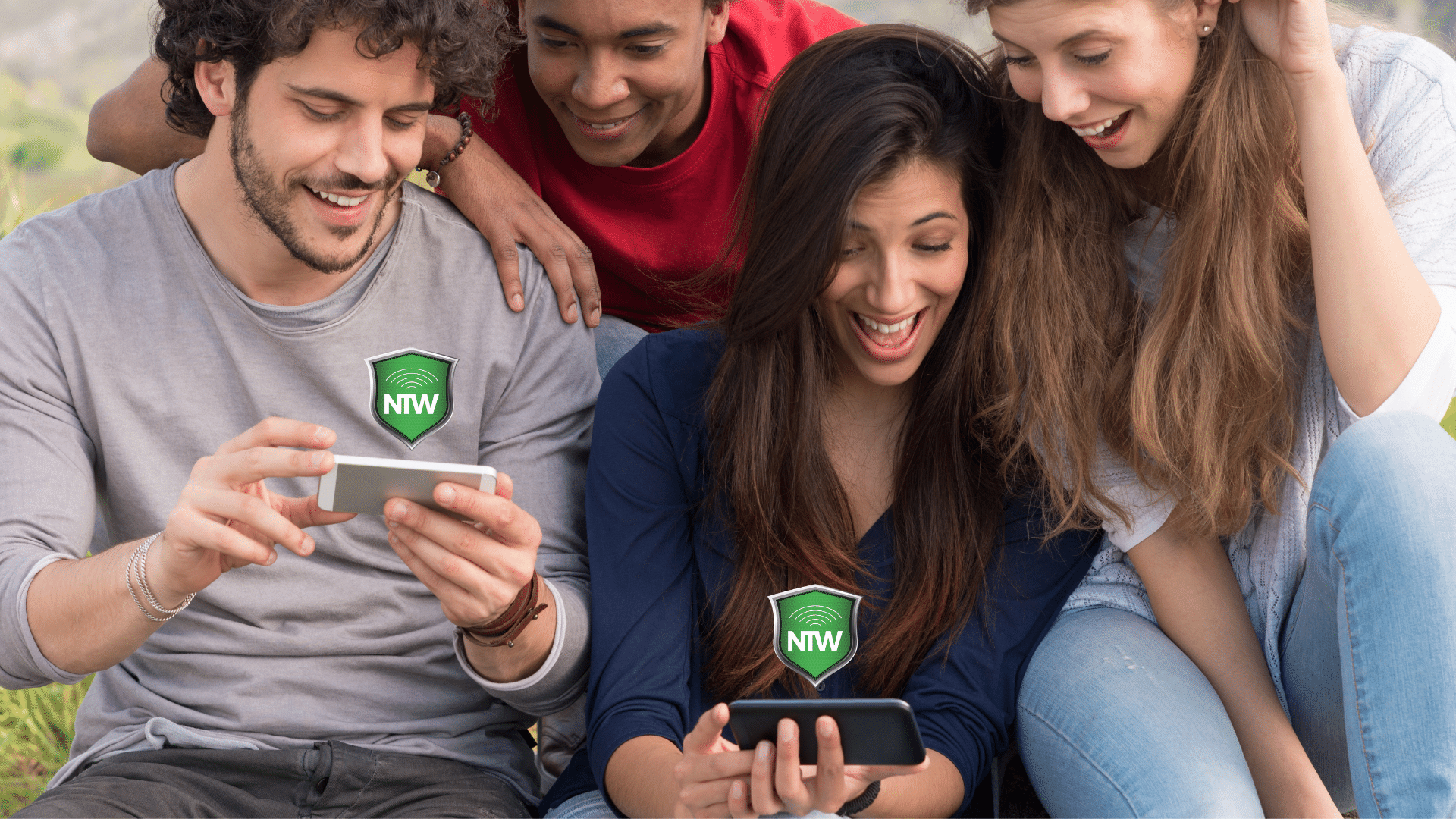 people laughing and looking at phones